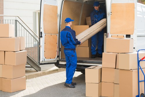 Removal team planning a move on a Shoreditch street