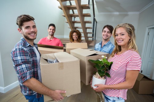 Packed boxes and furniture prepared for removals in a Shoreditch flat