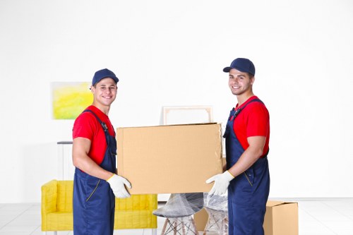 Student removals team loading boxes in Shoreditch street