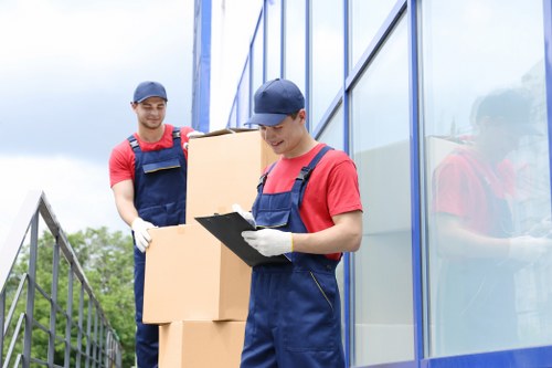 Team preparing moving equipment before a safe relocation job