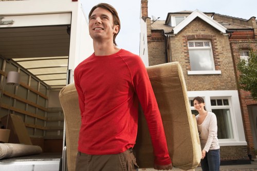 Office removals planning in Shoreditch with business moving boxes and desks