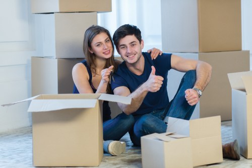 Careful packing and handling of boxed belongings during a move