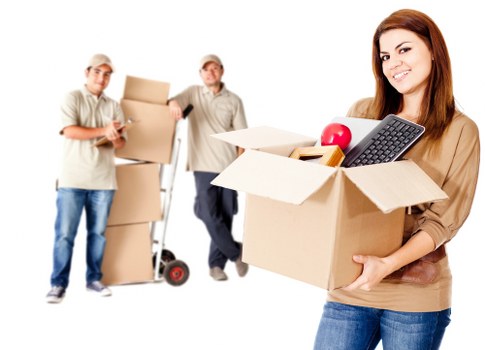Packed office furniture and equipment ready for a business move