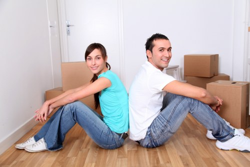 Boxes and furniture prepared for a flat move in East London
