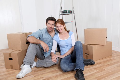 Packed household boxes and furniture ready for local removals in Shoreditch
