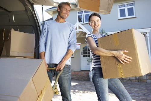 Fragile household items being packed carefully for a move